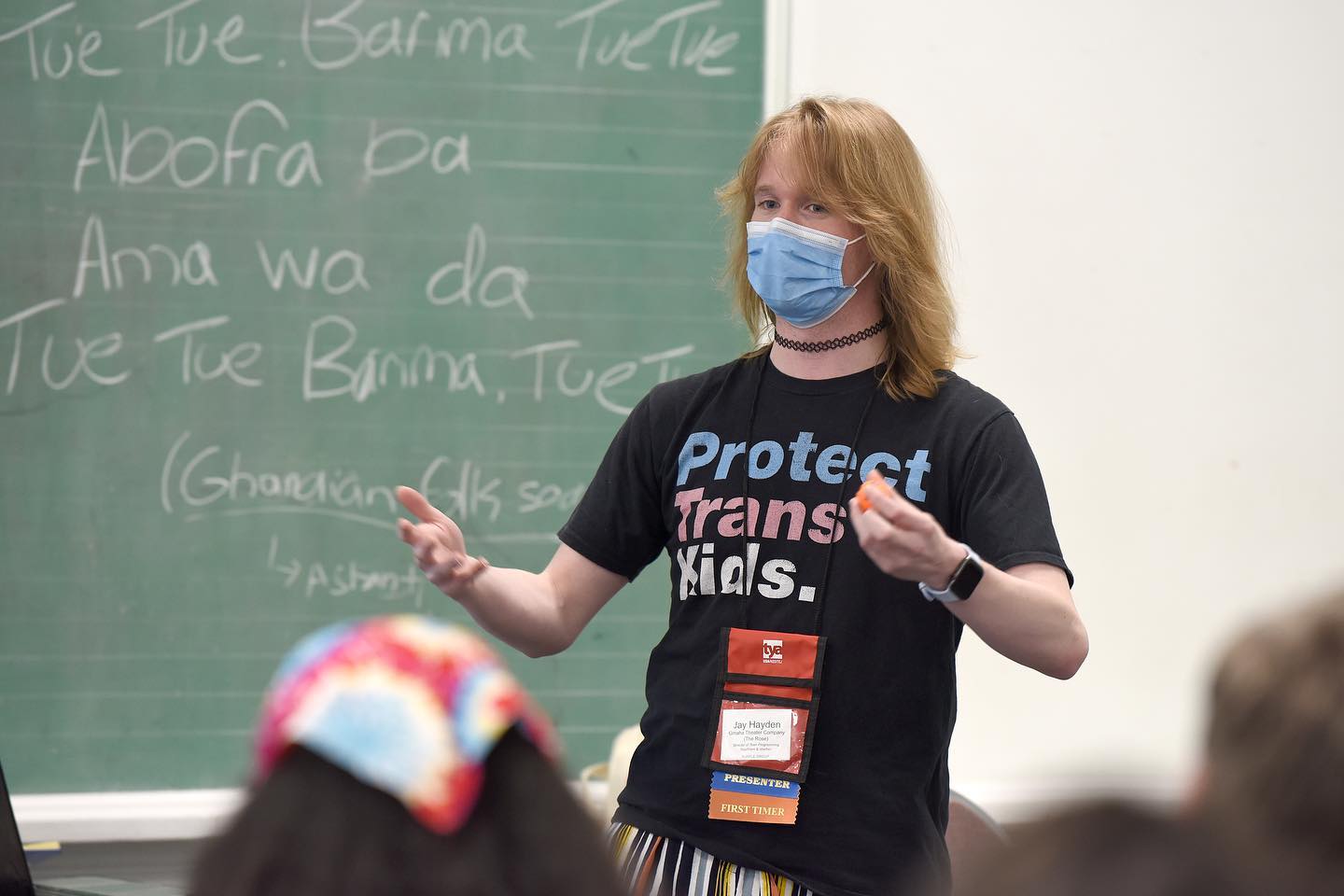 Jay at a TYA USA event smiling at the camera
